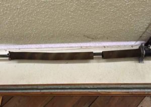 Broken garage door torsion spring Spokane